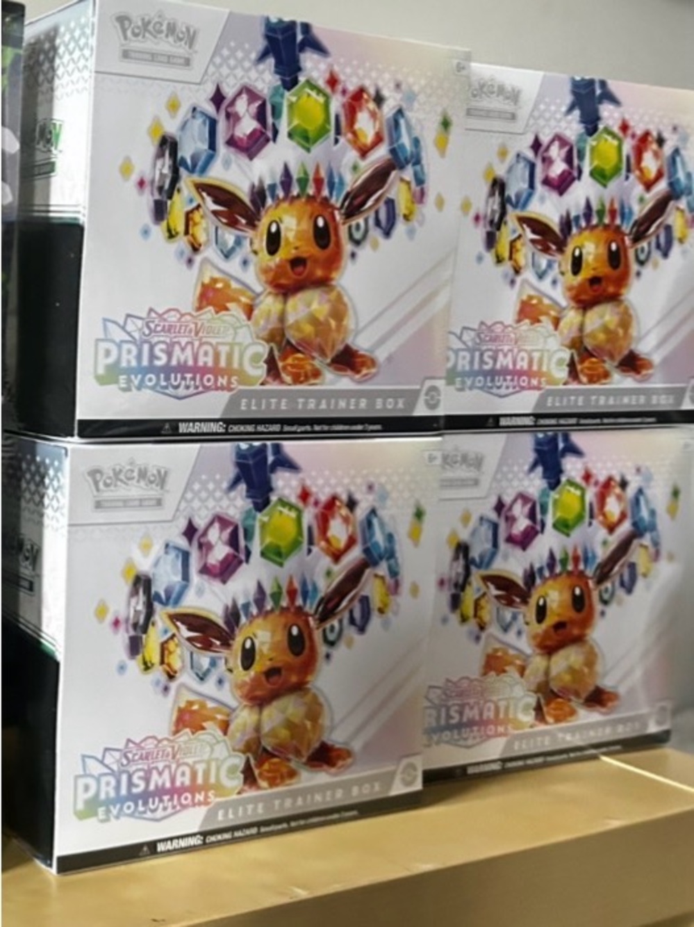 4 Pokémon Scarlet & Violet Prismatic Evolutions Elite Trainer Box- Eevee Artwork